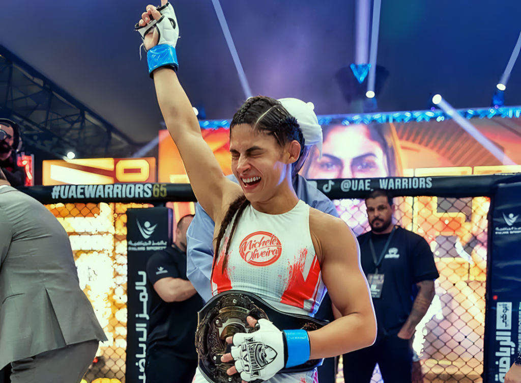 Michele Oliveira conquistou o cinturão peso-palha no UAE Warriors 65 ao vencer Lan Silva em uma luta de cinco rounds nos Emirados Árabes. A atleta da Nova União e Fight House consolida sua ascensão no cenário internacional com atuação técnica e estratégica.